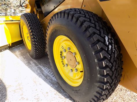 skid steer tire paw logo|skid steer snow tires.